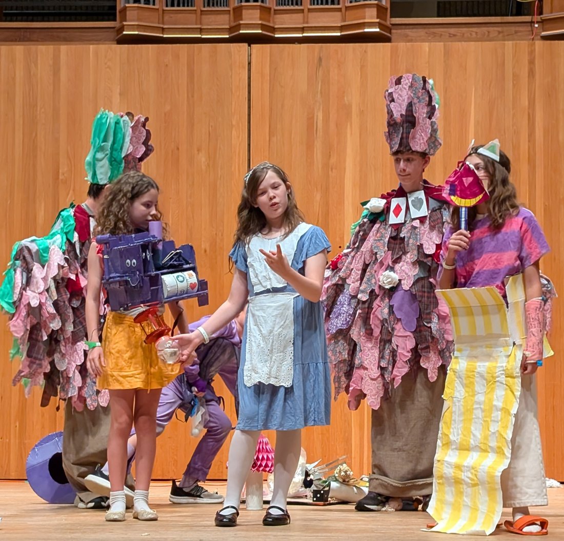 Team performing their Odyssey of the Mind skit on stage